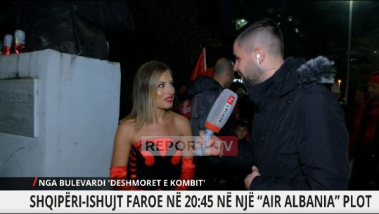 Me fustanin kuqezi dhe shqiponjë, modelja: E ndjek Kombëtaren edhe në transfertë