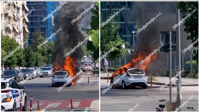 FOTOLAJM/Flakë dhe shtëllunga të zeza tymi! Digjet një makinë te ish-kompleksi Dinamo, shkak u bë një problem teknik